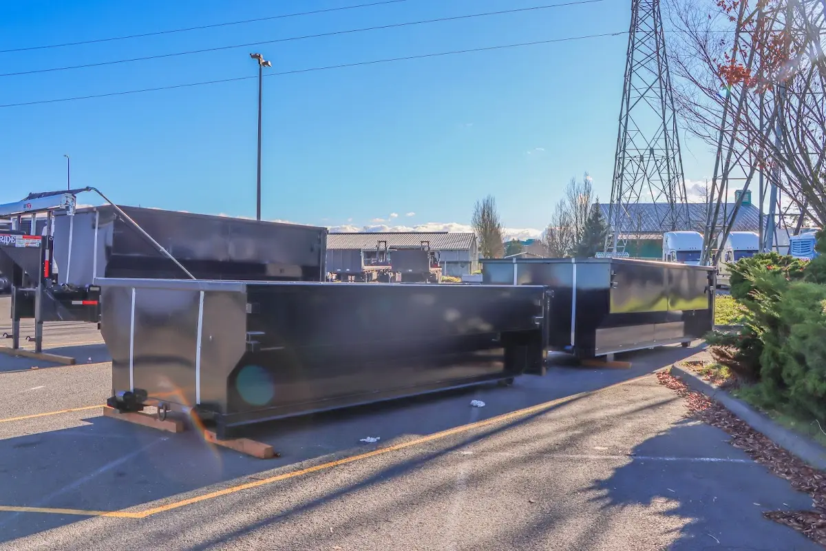 Roll-off dumpster ready for waste disposal at job site for 2 Yard Dumpster Rental in Goshen